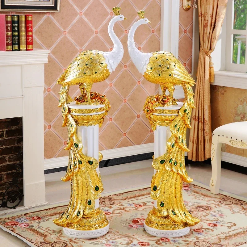 A Floor-to-ceiling ornament next to the TV cabinet in the living room, peacock ornament