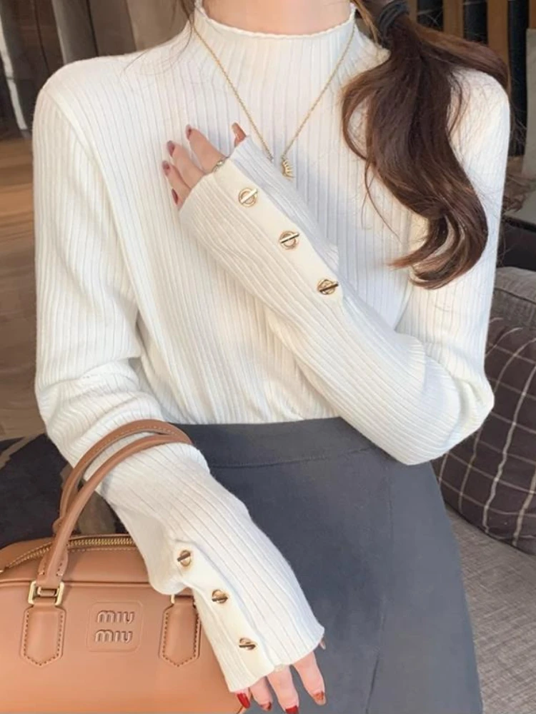 بلوفرات نسائية لخريف وشتاء 2025 سترات ضيقة محبوكة بأزرار صلبة وأكمام طويلة نصف ياقة عالية سترة نسائية غير رسمية