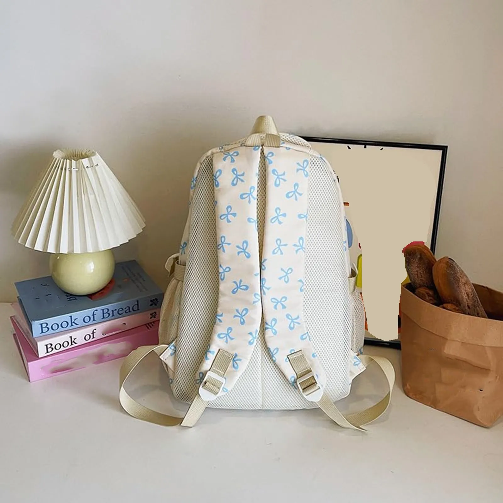 حقيبة ظهر نسائية كورية عصرية مطبوعة بفيونكة خفيفة الوزن وبسيطة حقيبة مدرسية للطلاب قابلة للتعديل طقم حقيبة نسائية مكون من ثلاث قطع