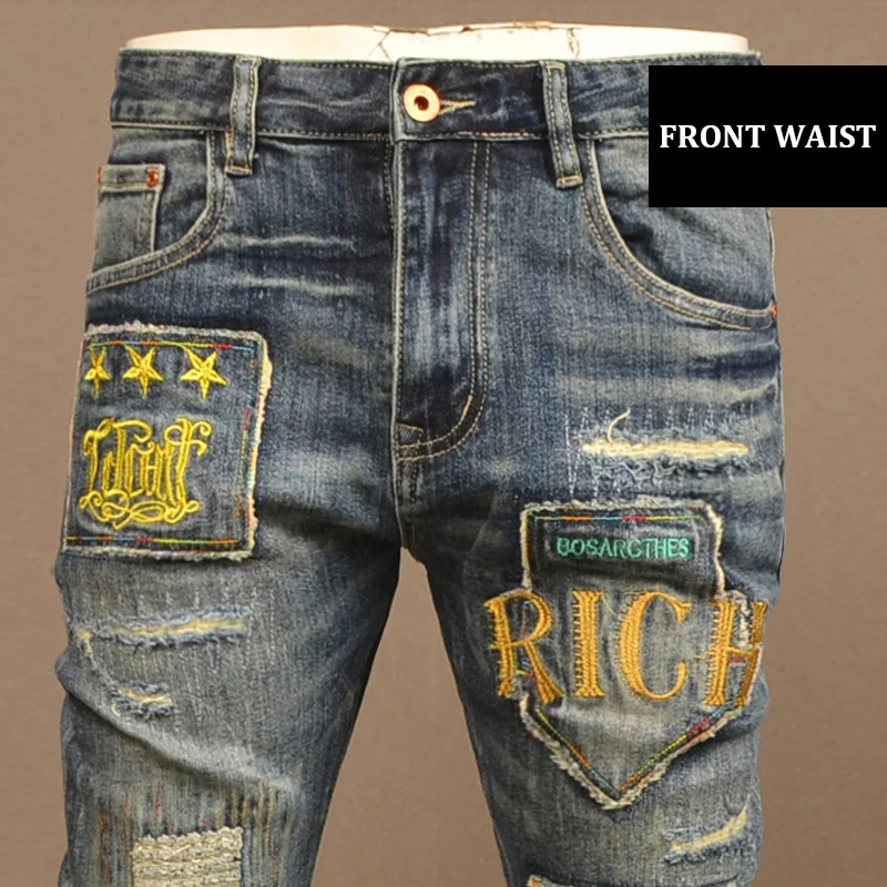 Jeans da uomo di alta moda di strada retrò lavati blu elasticizzati Slim Fit Jeans strappati Vintage da uomo pantaloni di Jeans Hip Hop firmati con patch