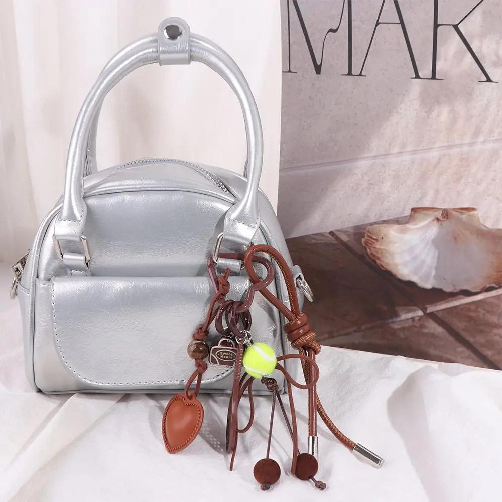 Miu Style marron arc coeur sac pendentif sac à dos décor à la main Tennis porte-clés mignon en cuir coréen charme corde porte-clés porte-clés