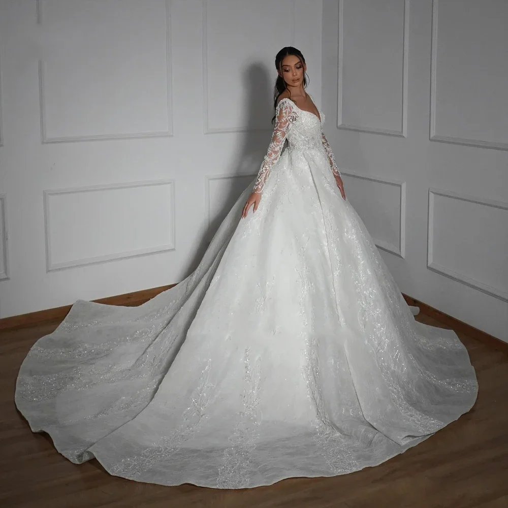 Flavinke Abiti da sposa principessa personalizzati 2025 Scollo a V maniche lunghe Scintillanti Perline Appliques Abiti da sposa con strascico in pizzo