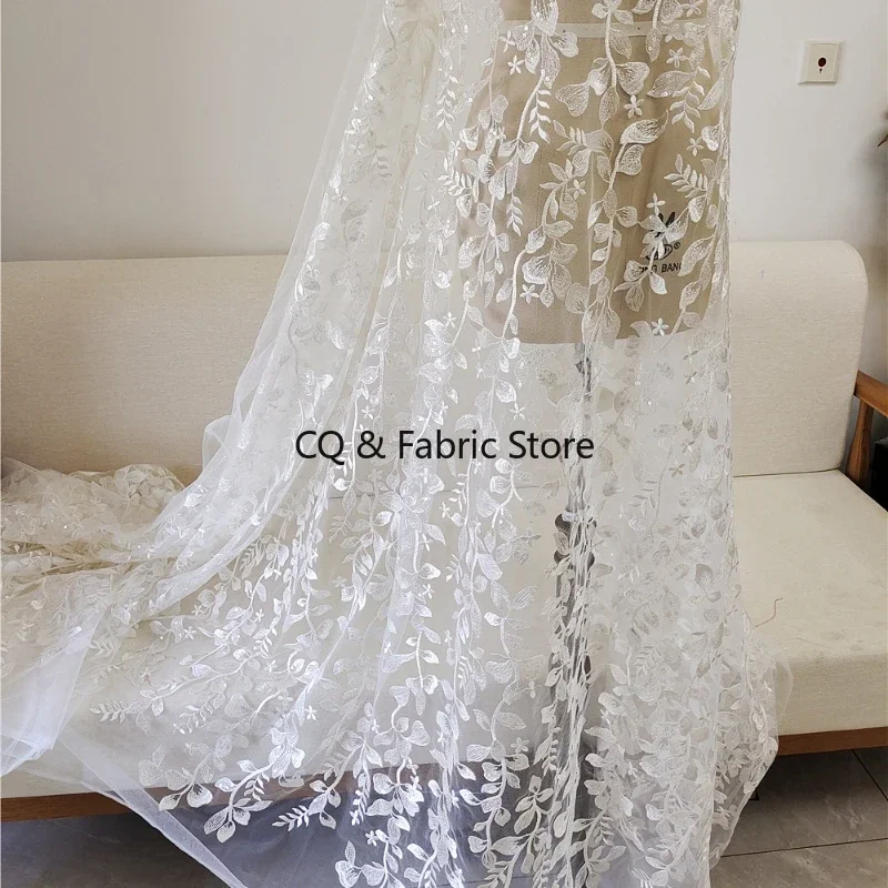 

Белоснежная вышивка, блестки, листья, кружевная ткань для свадебного вечернего платья, дизайнерская ткань