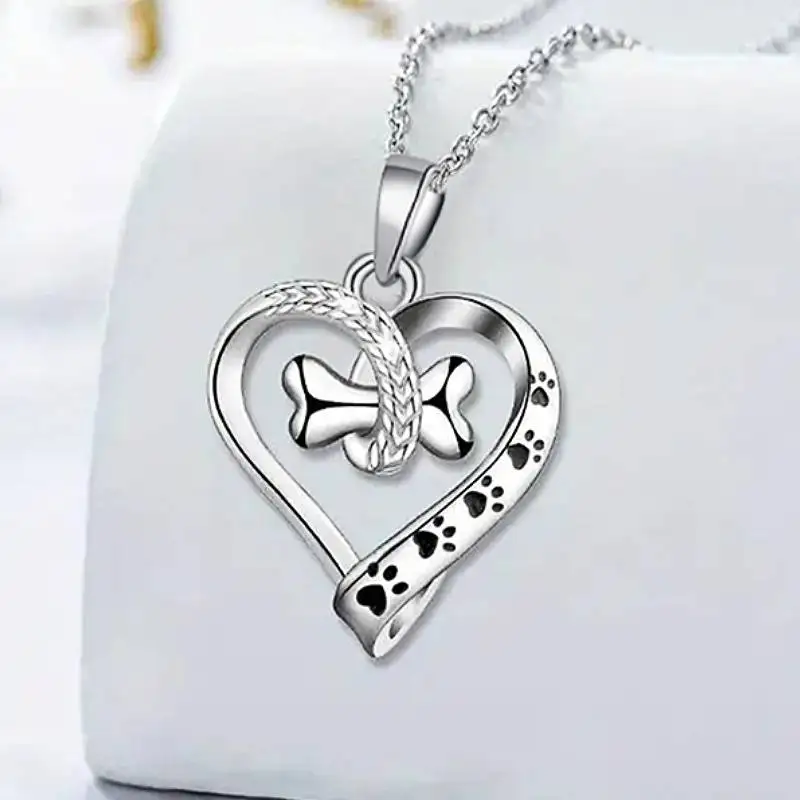 Huitan Freundliche herzförmige Damen-Anhänger-Halskette mit Hundeknochen-Fußabdrücke, Tier, trendige Accessoires, frischer Stil, Geschenkschmuck