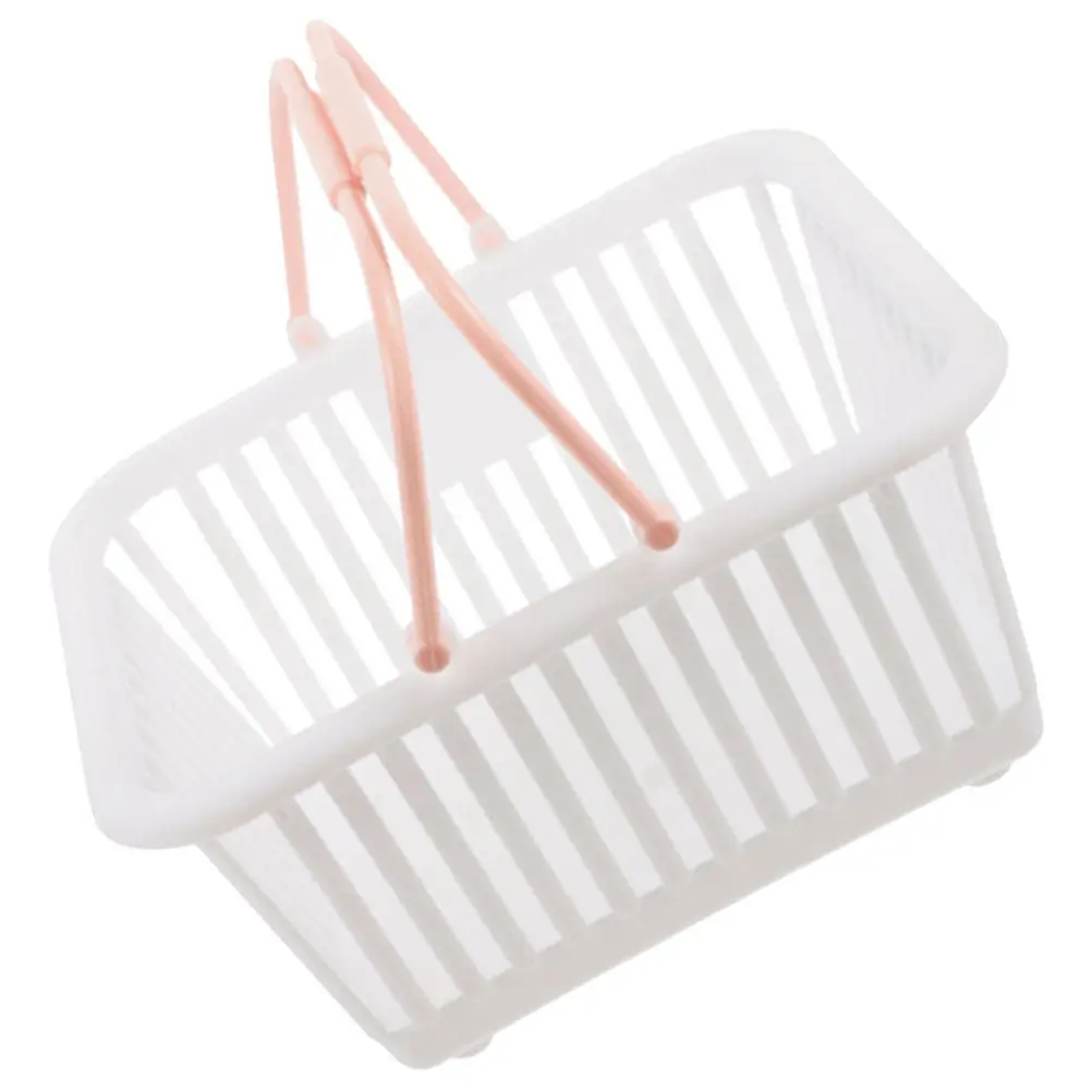 Pequeña cesta de almacenamiento de plástico con asas, compacta y portátil, ideal para guardar cosméticos, frutas, verduras, productos de la compra y artículos de baño.