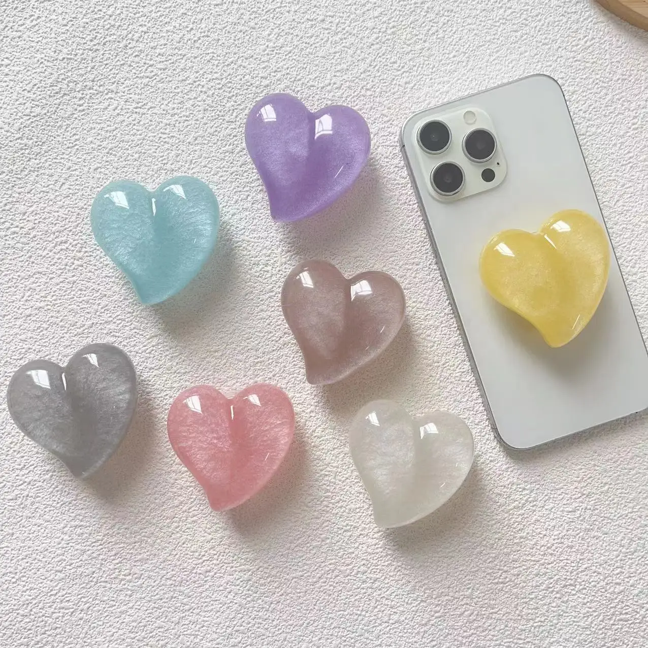

Macaron-colored Creative Heart-shaped Resin Support Folding Airbag Phone Stand for Iphone 17 Samsung S26 Grip Tok Bracket Holder