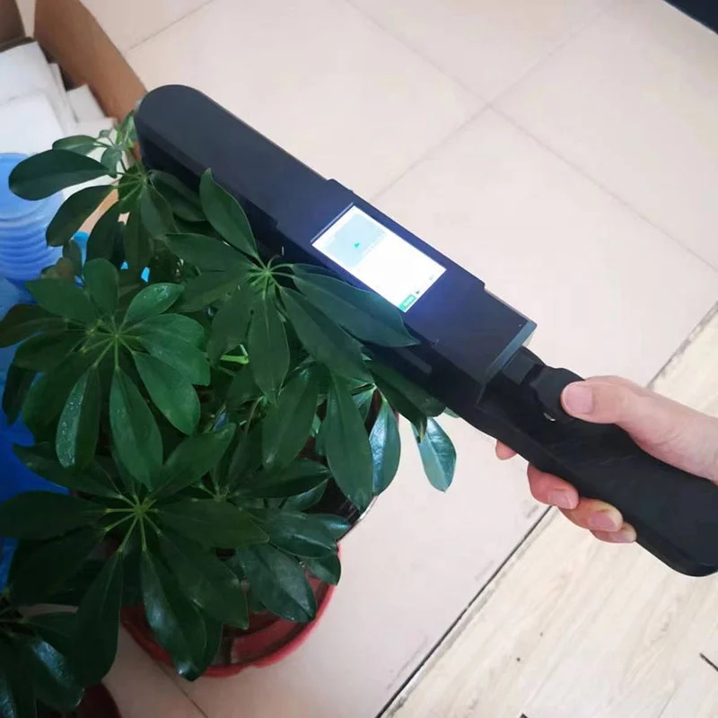 Leaf area measuring instrument, photographic image analysis of living plant leaves, handheld plant leaf length and width tester