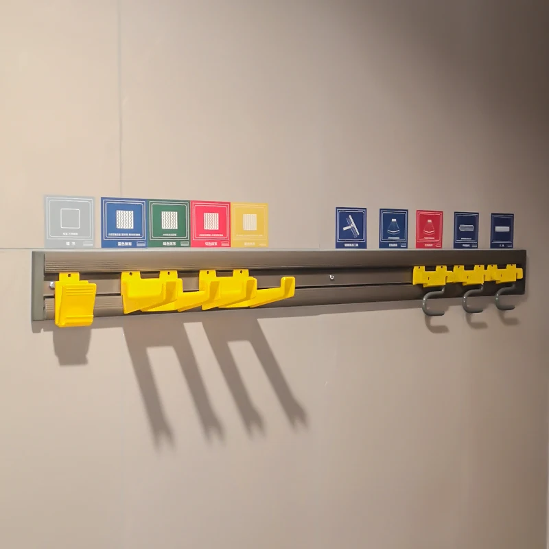 The boxed tool kit includes yellow elongated components and multiple matching small parts