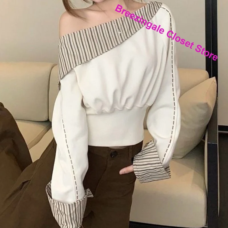 French design with contrast stripes stitching long-sleeved sweater women's spring and autumn new temperament slim joker top.