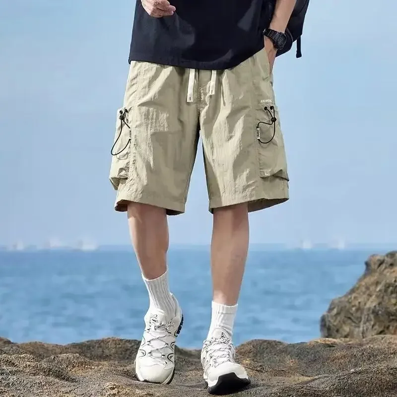 

Короткие брюки для мужчин с эластичной резинкой на талии, однотонные широкие мужские шорты-карго с карманами и шнурком, мешковатые свободные винтажные уличные брюки Y2k