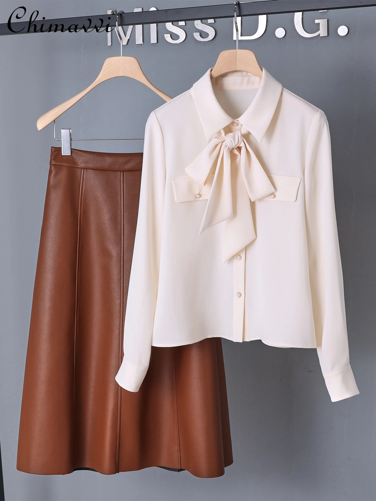 

French Elegant Commuter Suit Simple Polo Neck Lace-up Bow Shirt Top High Waist A-line Leather Skirt Two-piece Set Women Autumn