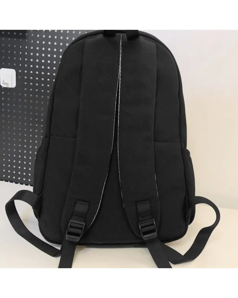 Black ergonomic student backpack padded back panel adjustable straps water resistant fabric suitable for daily school work