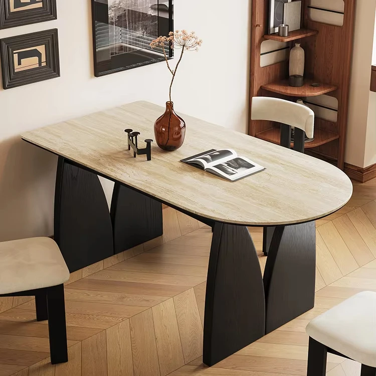 

dining table set with a light wood exterior top, black geometric base and matching chairs, perfect for modern interiors