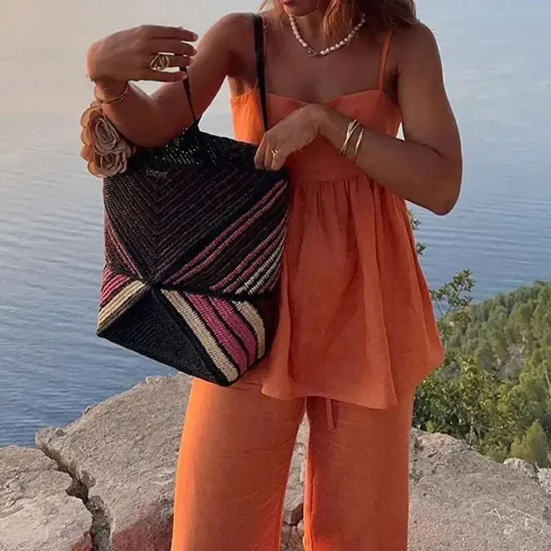 

Casual Vacation Two Piece Set Sexy Off Shoulder Top And Long Pants Outfit Spring Summer Hollow Sleeveless Solid Color Women Suit