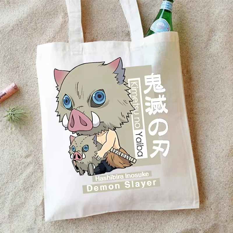 Sac à bandoulière en toile Demon Slayer, sacs de rangement imprimés de dessin animé, grande capacité, papeterie pour étudiants, sac à main écologique, cadeaux d'anniversaire