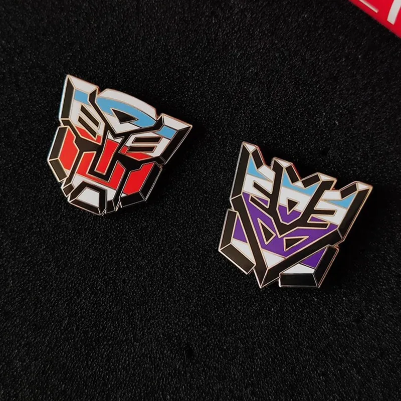 Hasbro Transformers Lapel Pins การ์ตูนตัวอักษรเคลือบ Pin น่ารักเข็มกลัดโลหะ Lapel ป้ายการ์ตูนตลกเครื่องประดับของขวัญ