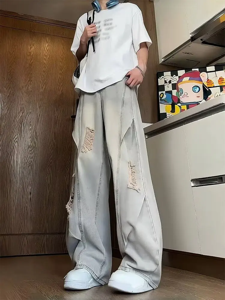 جينز ممزق مغسول باللون الأزرق للرجال صيفي أمريكي عالي الشارع فيبي سروال فضفاض واسع الساق