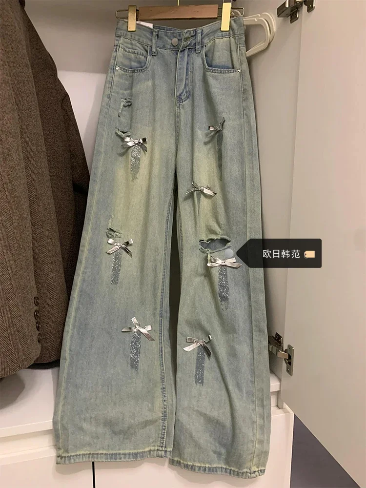 Jeans a gamba larga con fiocco strappato di grandi dimensioni donna americana 2024 estate nuovi pantaloni larghi in Denim sottile con tasca a vita