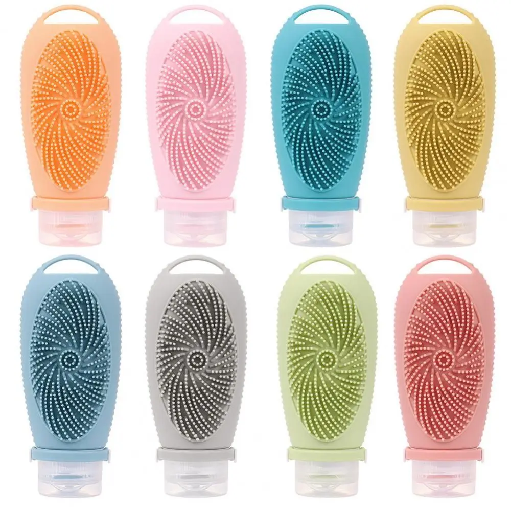 Przenośna butelka z szczotką pod prysznic 2 w 1 Silikonowe butelki podróżne 100 ml z możliwością wielokrotnego napełniania Wyciskane, szczelne pojemniki na przybory toaletowe