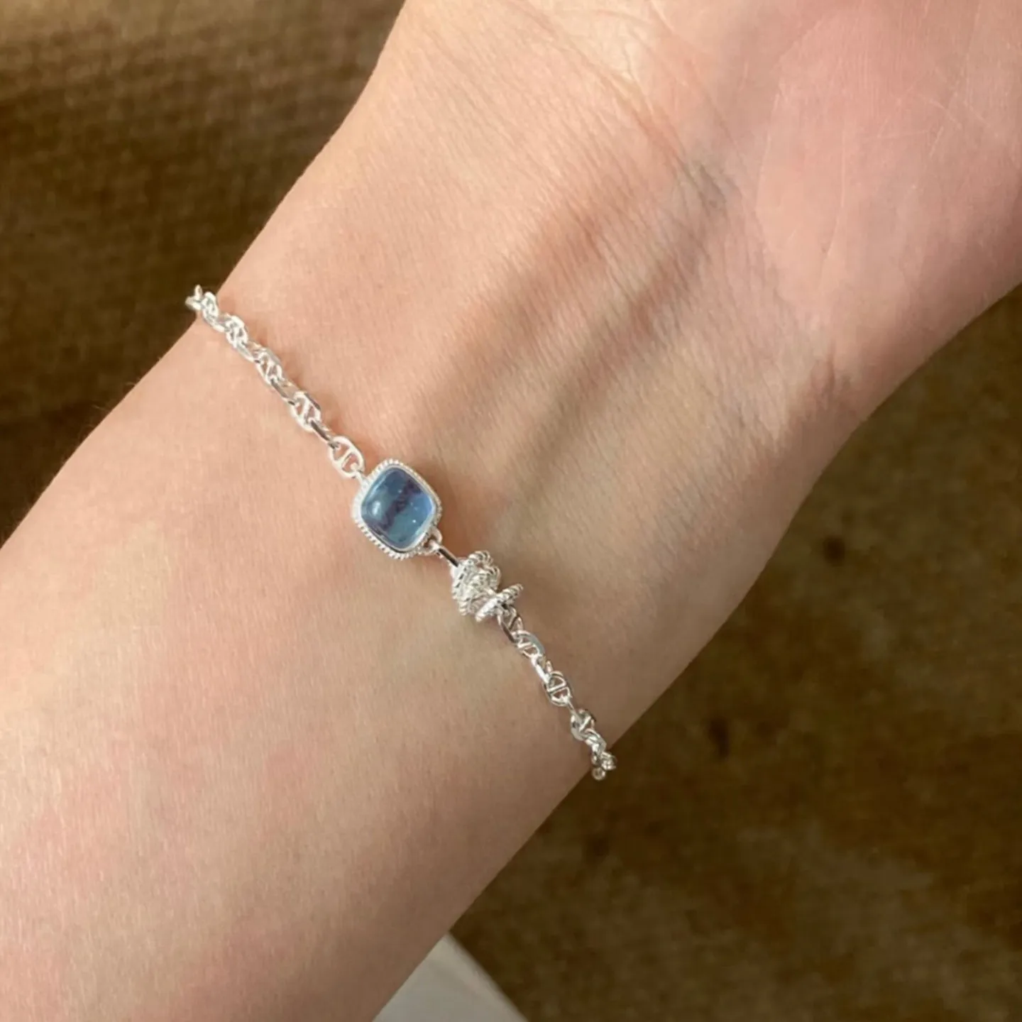 Delicate Intricate Silver Linked Chain Central Blue Square Glow Stone Elegant Glimmering Wrist Decor Daily Accessory