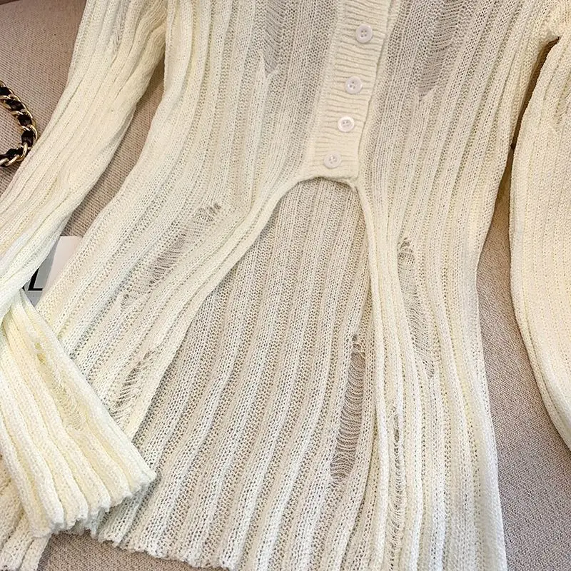 سترة نسائية مجوفة للصيف واقية من الشمس Ins مزاجه متماسكة رقيقة تنفس أنيقة الكورية موضة الخامس الرقبة واقية من الشمس Harajuku