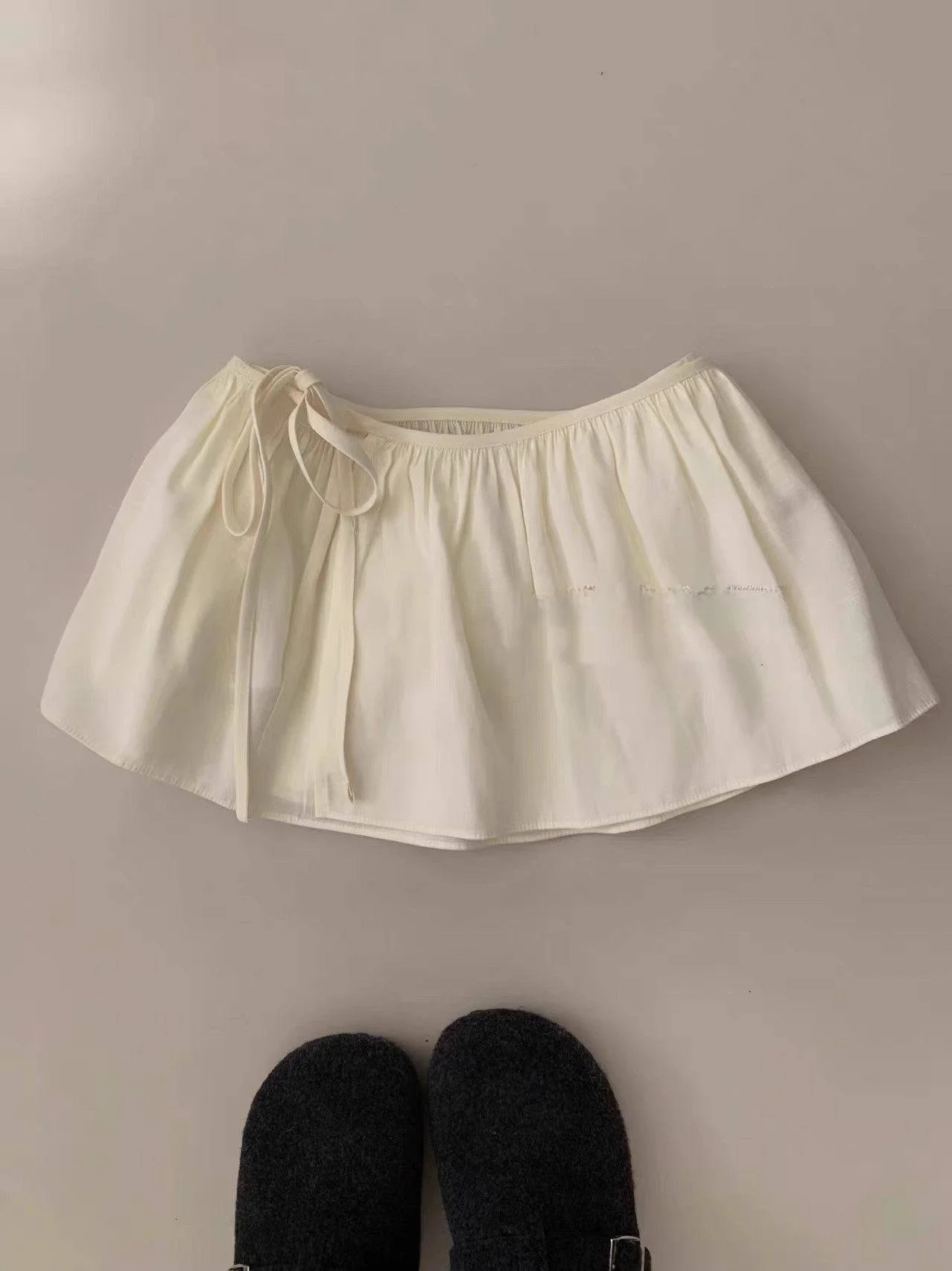 

Spring 2026 Women's A-Line Lace Trim Belted Skirt Curtain Versatile Layering Style Korean Commute Standard Fit PVC Material