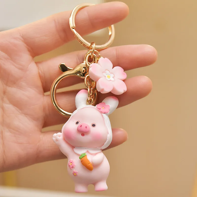 Three Dimensional PVC Soft Glue 2023 New Cute Raincoat Piglet Keychain Kawaii Milk Satchel Pig Doll for Woman Bag Key Pendant