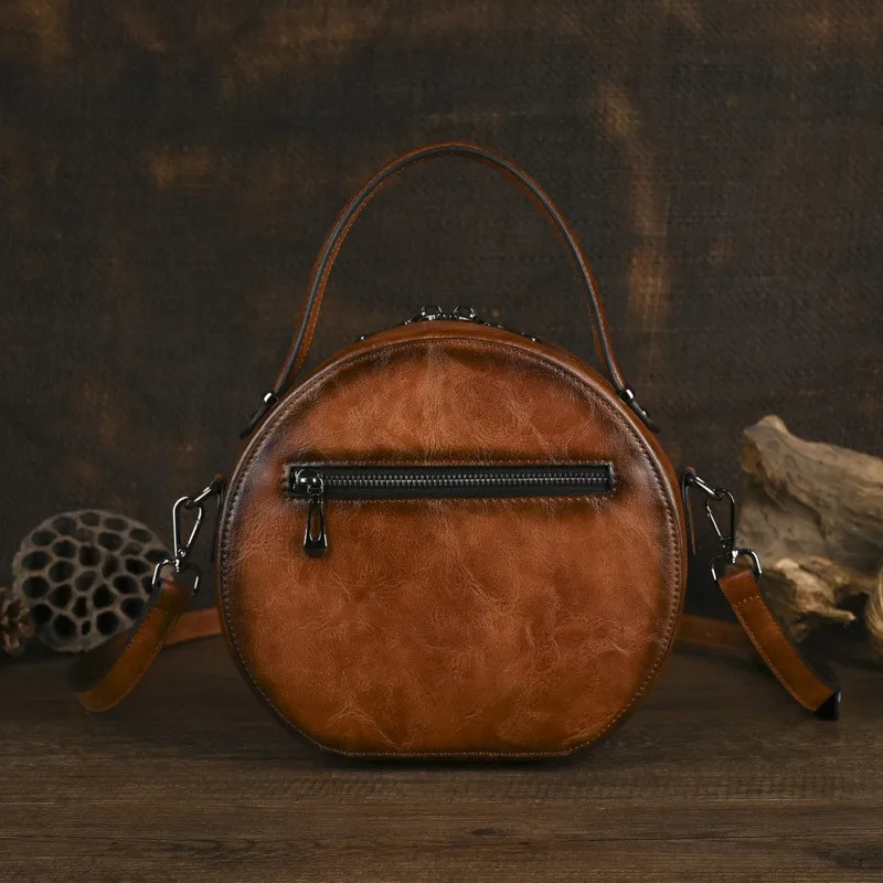 Johnature 2026 New Circular Retro Women's Leather Bag Hand Embossed Versatile Shoulder Crossbody Bags