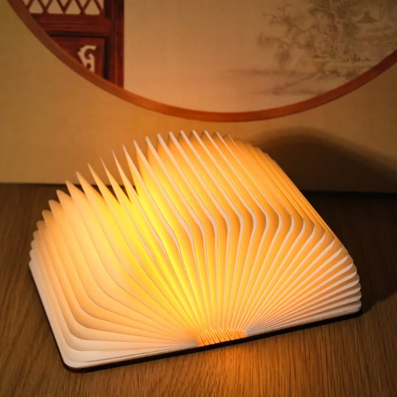 Luz de libro de regalo creativa, iluminación de protección ocular, grabado de madera led, página de carga plegable, luz nocturna giratoria