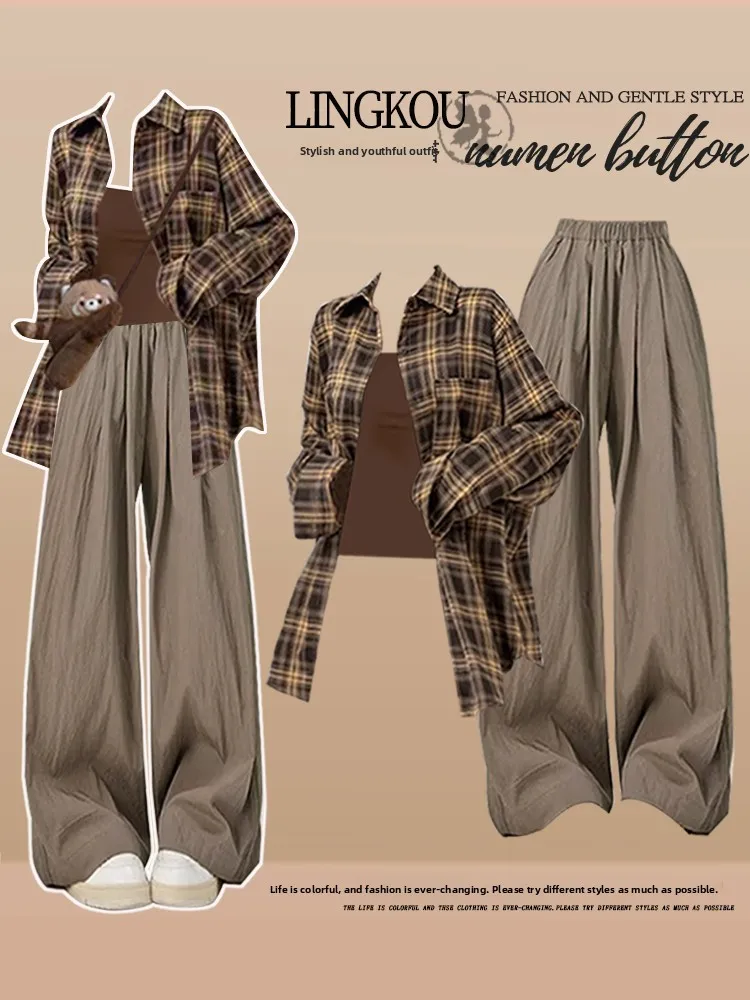 

Комплект из трех предметов: рубашка в клетку в винтажном стиле, повседневные брюки с широкими штанинами и топ на бретельках. Модный женский осенний комплект больших размеров.