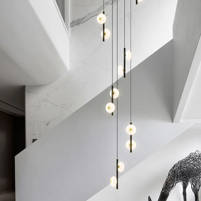 Staircase light, long pendant light, simple duplex, cantilevered villa apartment, revolving staircase, creative lighting fixture