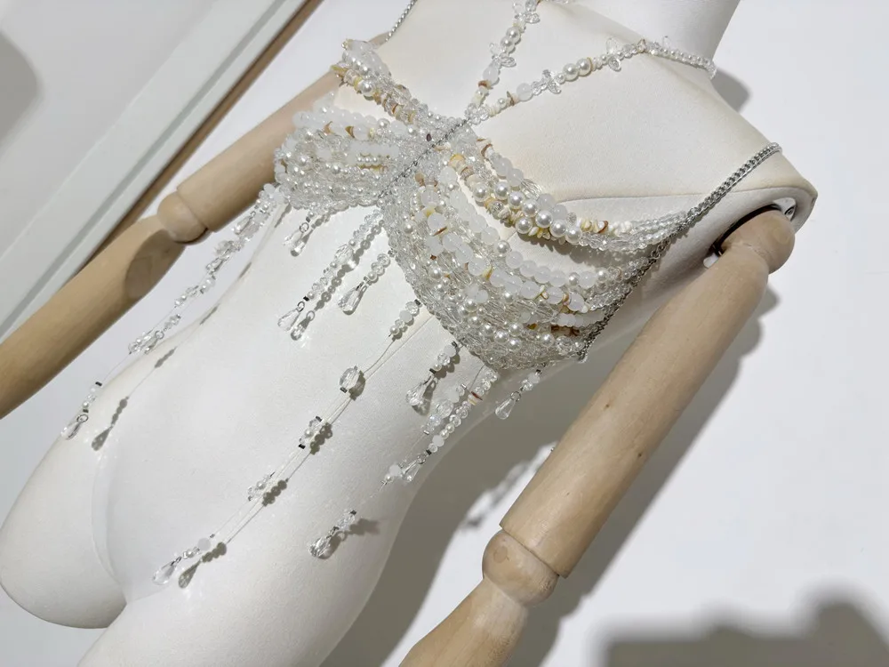 حمالة صدر جديدة لعام 2025 مع شرابة للنساء سترة مثيرة وجذابة على شكل سلسلة صدرية مفرغة ملابس شاطئ للعطلات y2k صيفية