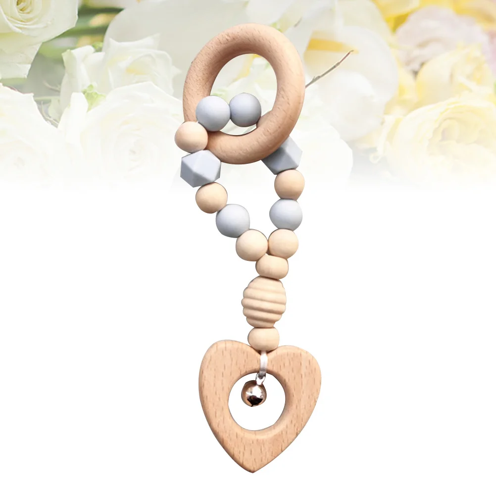 ยางกัดเด็กแบบมีเสียง ทำจากไม้และซิลิโคน พร้อมจี้รูปทรงต่างๆ ช่วยเสริมพัฒนาการทางการเรียนรู้และการพัฒนาสมอง สำหรับเด็กแรกเกิดและเด็กเล็ก