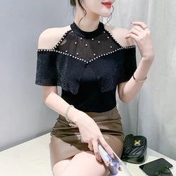 T-shirt stile coreano estivo nero Chic Sexy donna o-collo scava fuori diamanti lucidi Ruffles top manica corta Tees 2024 nuovo 45140