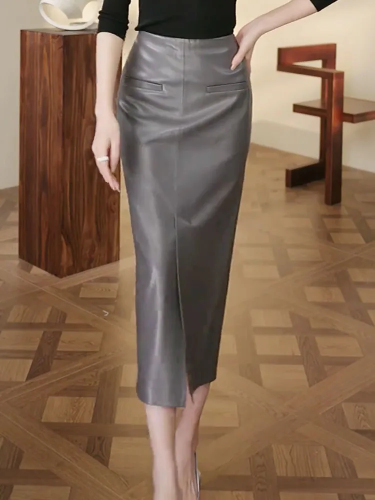 Falda de cuero PU de cintura alta con diseño asimétrico drapeado y efecto cemento, sensación de moda para primavera y otoño, nueva colección para mujer.