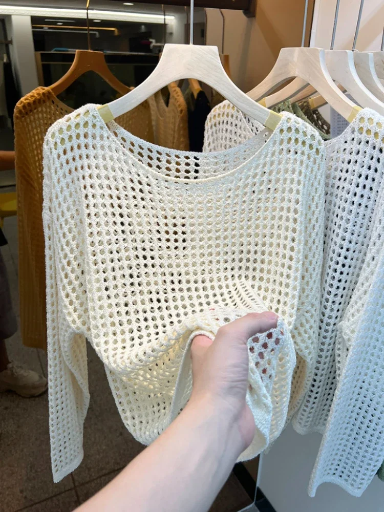 

French Long Sleeved Knitted Sweater for Women in Spring Summer 2025 Thin Style Loose Hollow Out Cover New Western-style Mesh Top