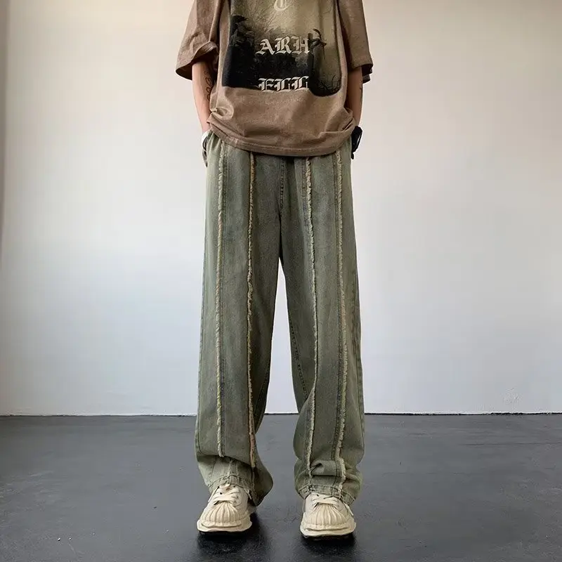 

Осенне-зимние мужские джинсы большого размера (до 16 кг), новые, желтые, окрашенные в технике «грязевая окраска», в американском уличном стиле, винтажные, свободного прямого кроя