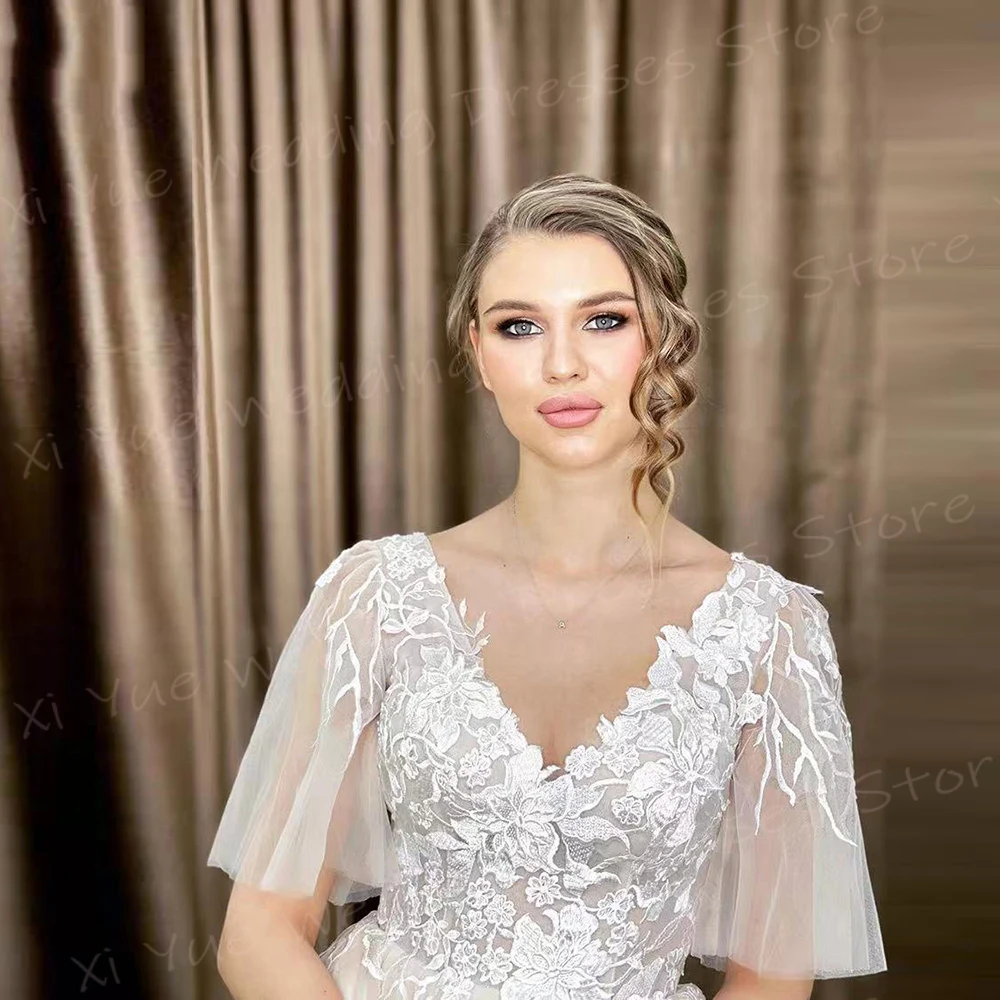 2025 Romantico A Line Abiti da sposa per le donne Appliques in pizzo Abiti da sposa Affascinante scollo a V manica corta Tulle Vestido De Novia