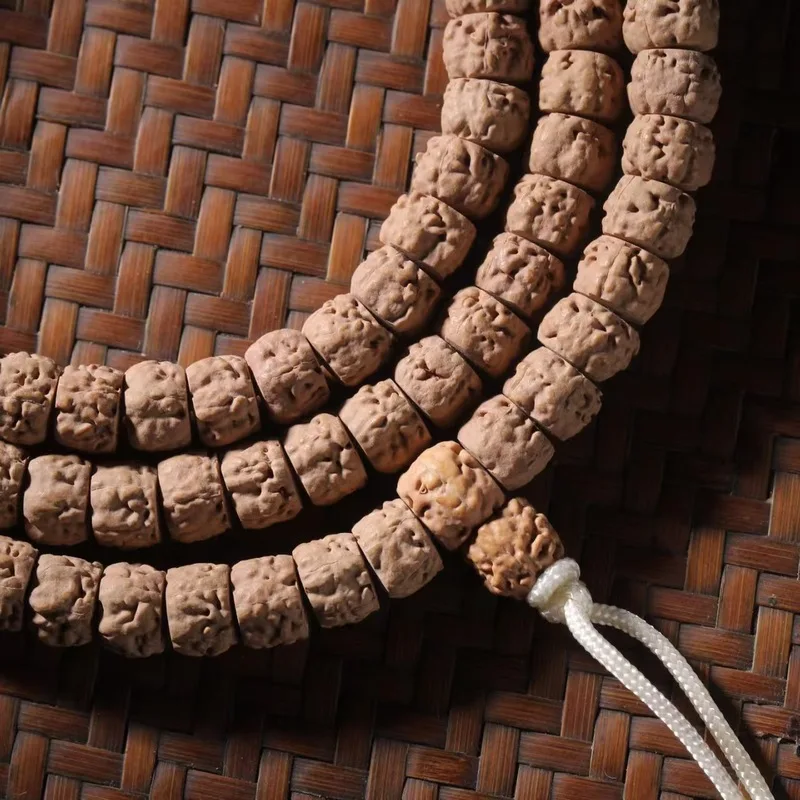 Exquisitely crafted, round-shaped, Tibetan-style -cut Buddha hand beads with five claws, golden, and vajra bodhi be