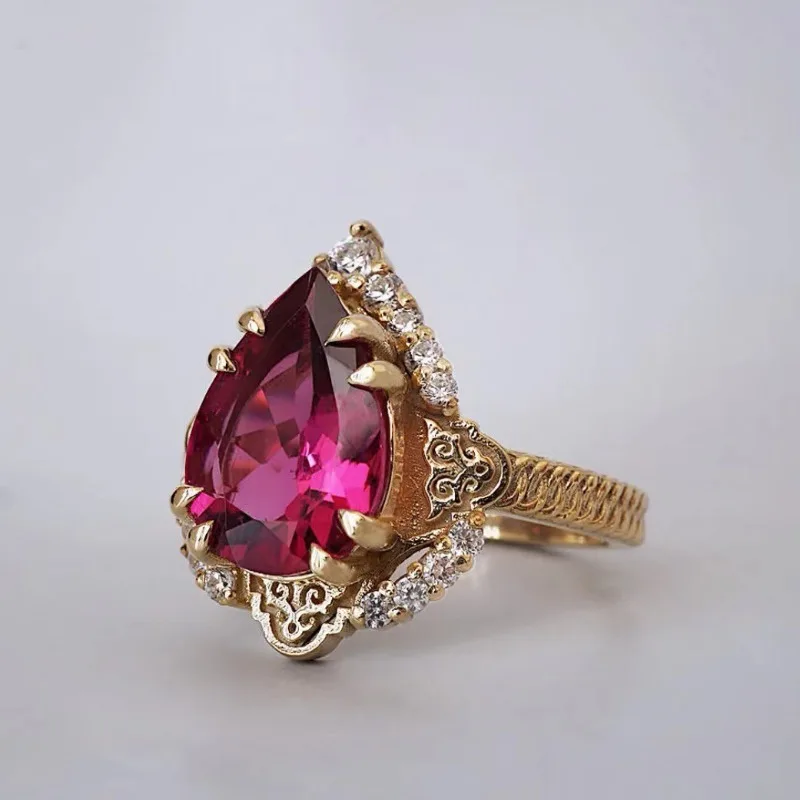 New European and American jewelry inlaid with water droplet red zircon retro palace gemstone women\'s ring