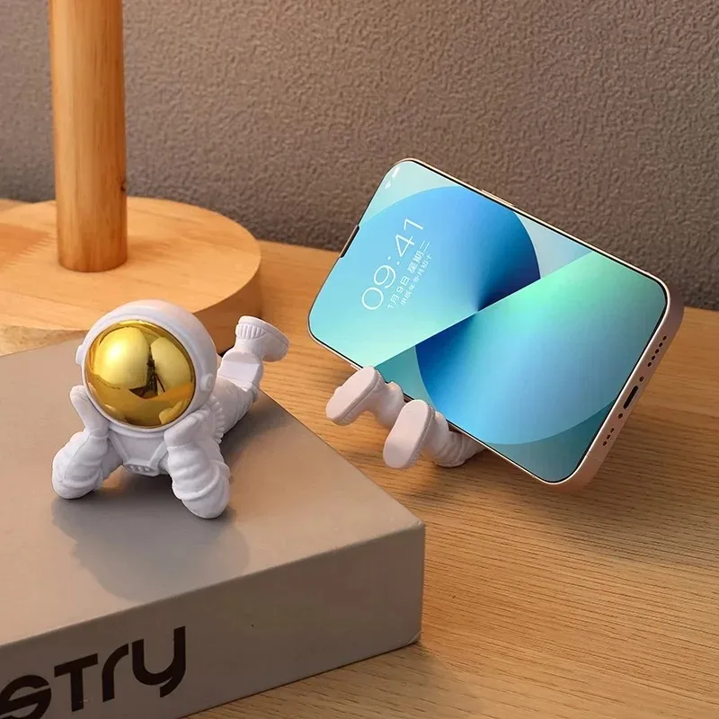 Spaceman Astronaut Desktop Sculpture, Multi-function Phone Stand Ornament for Home Desk & Office Table Decoration