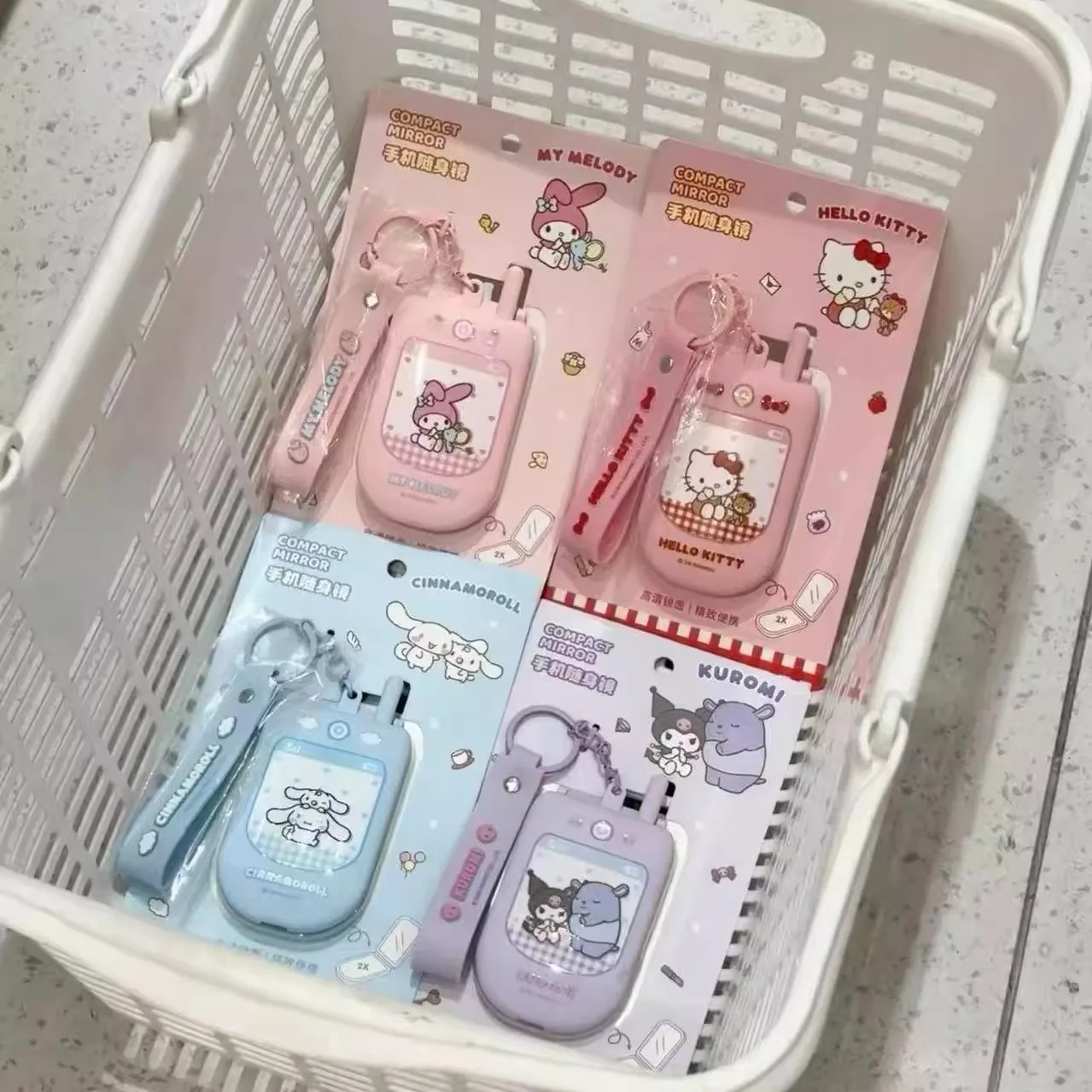 

Sanrio Characters Phone-Shaped Foldable Compact Mirror Keychain - Cute Portable Makeup Mirror for Girls, Gift for Anime Fans