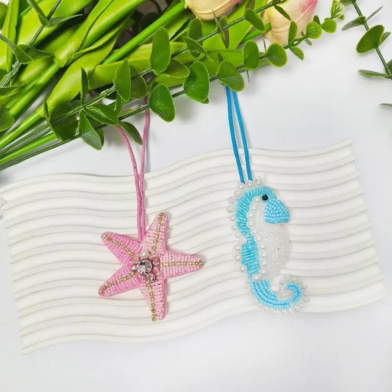 แผ่นปะรูปดอกไม้รูปปลาดาวประดับเพชร ทำมือ เหมาะสำหรับตกแต่งเสื้อผ้า พวงกุญแจ และกระเป๋า