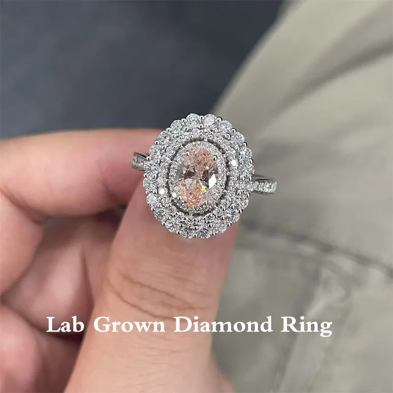 0.75 Ct Fancy Intense Pink Oval Cut Lab Grown Diamond And 0.406Ctw White Round Cut Side Stones 14K White Gold