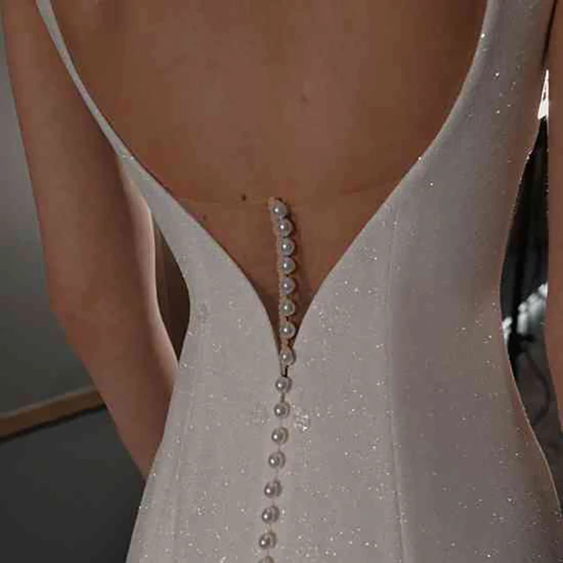 Customized V Neck Sheath Backless Bling Shiny Wedding Dress Open Back Shimmer Long Bow Train Mermaid Pearls Bridal Gowns