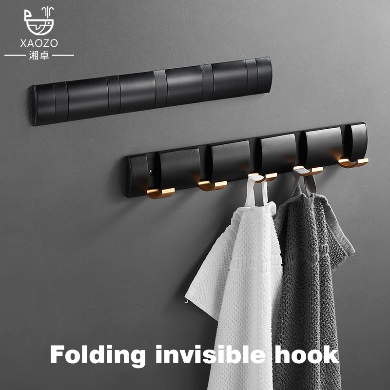 On the Bathroom Wall  Behind the Door Hanging Luxurious Clothes Hooks  and  Hidden Folds