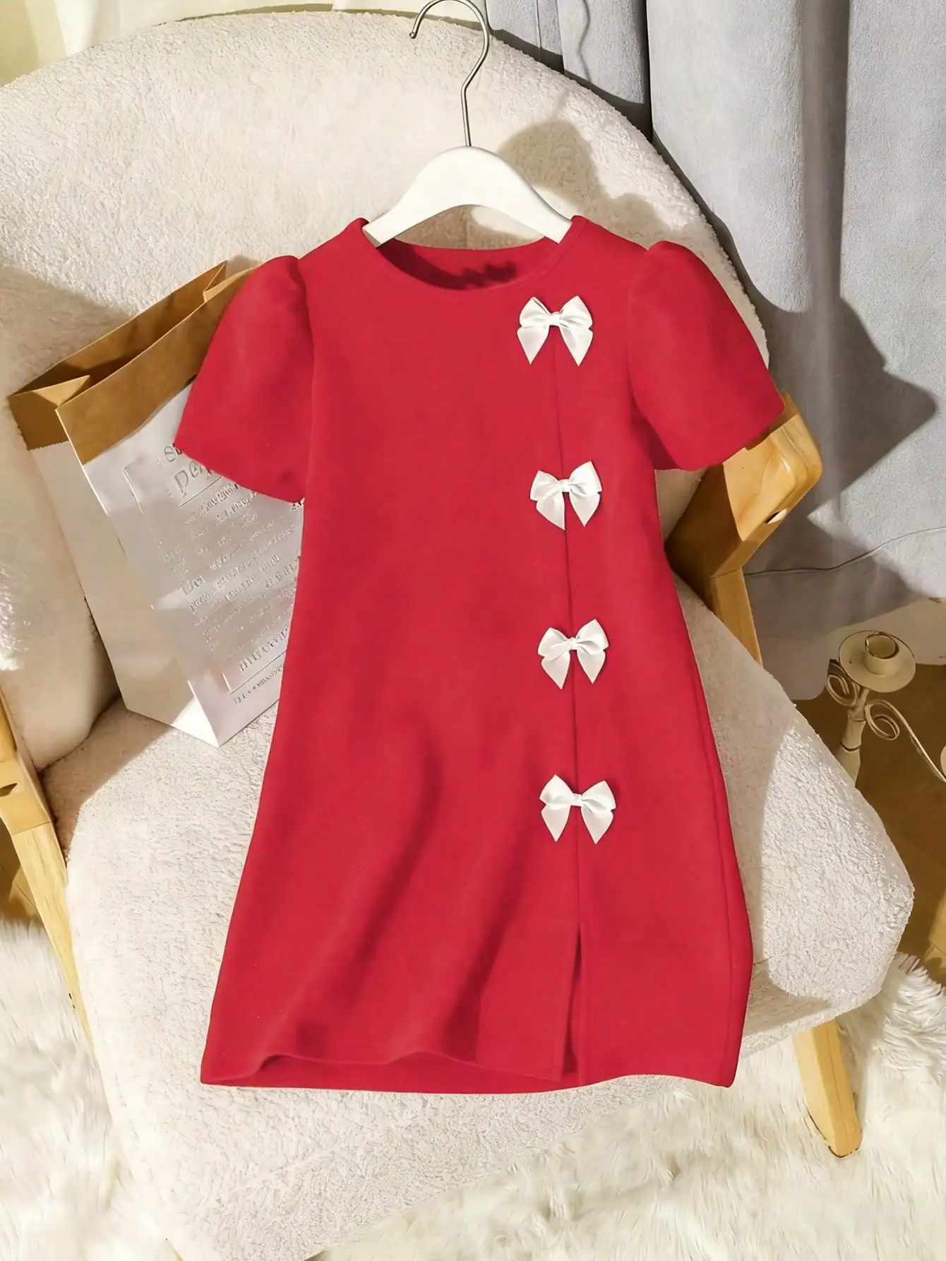 Chic black A-line dress for teenage girls with elegant 3D bow details and bubble sleeves for spring and summer knee length