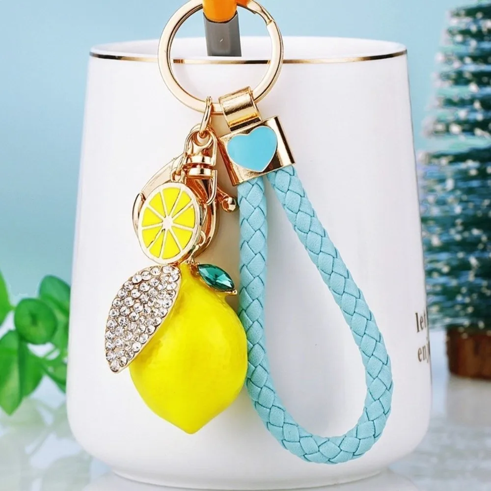 Süßer Zitronen-Schlüsselanhänger aus Legierung, kreativer Fruchtform-Anhänger mit geflochtenem Seil, Taschenanhänger, 3D-Metall-Schlüsselring, Geschenk – Detail 8