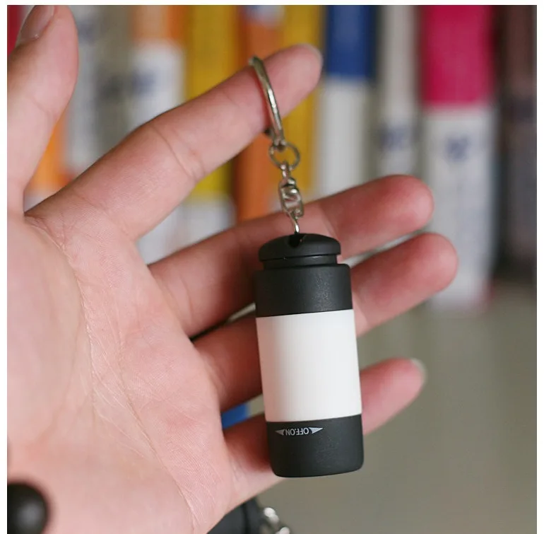USB wiederaufladbare LED multifunktionale Taschen-Schlüsselanhänger-Taschenlampe mit starkem Licht, wasserdicht, für Outdoor-Wandern, Camping, Mini-Taschenlampe – Detail 4