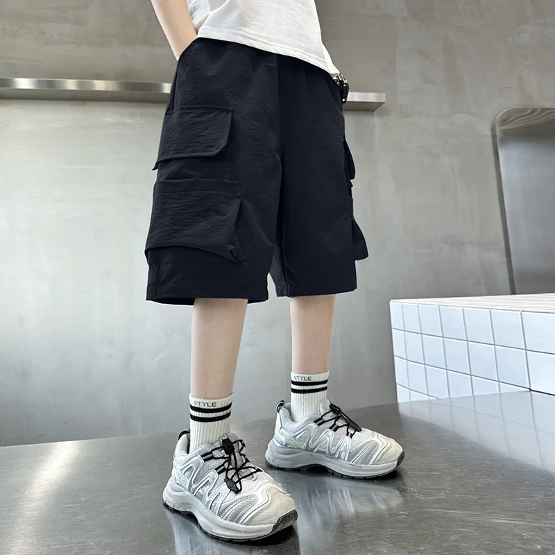 New Summer Kids Child Loose Casual Cargo Shorts With Big Pocket on The Side For Teens Boy Fashion Knee Length Capris Pants 5-14T